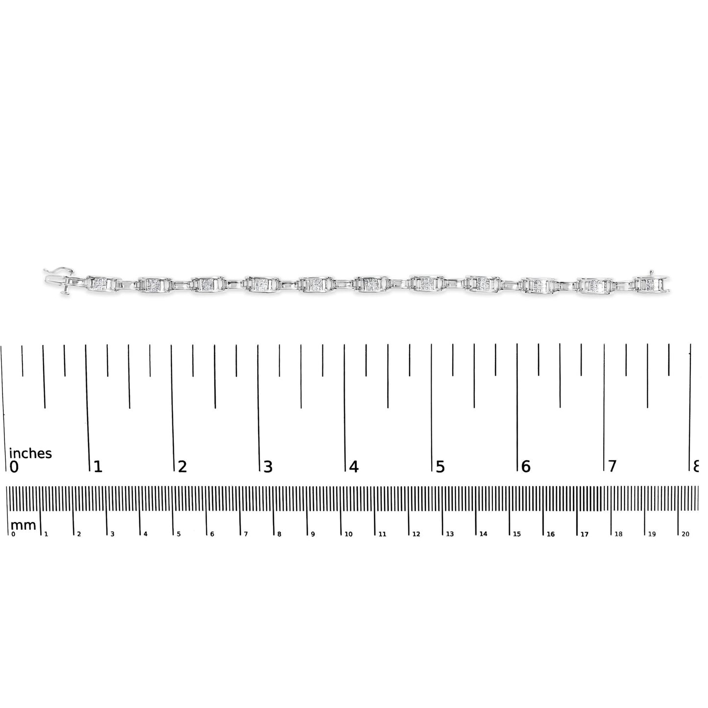 White metal bracelet with evenly spaced rectangular links set with white princess-shaped gemstones in an invisible setting, displayed horizontally on a ruler, top-down view.