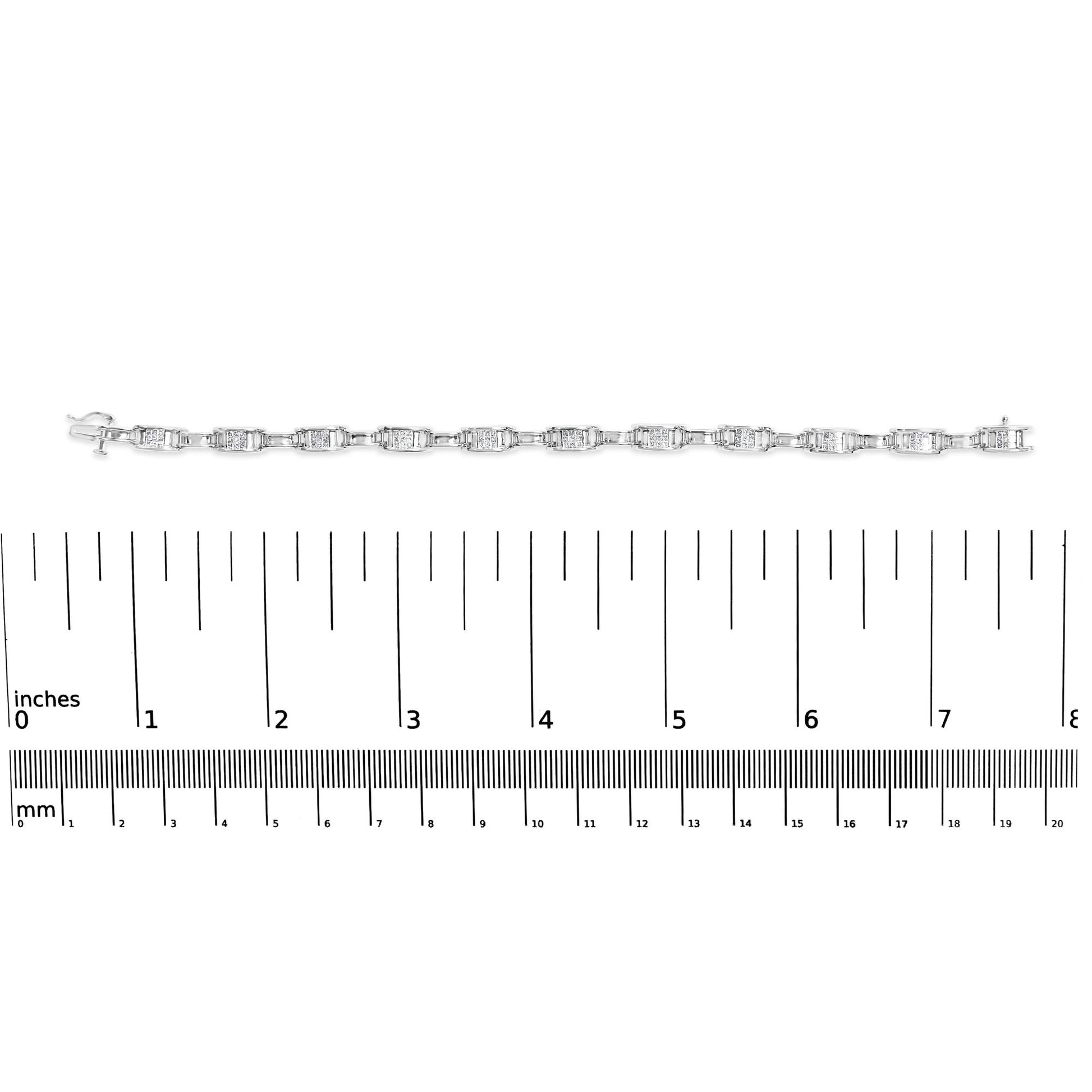 White metal bracelet with evenly spaced rectangular links set with white princess-shaped gemstones in an invisible setting, displayed horizontally on a ruler, top-down view.