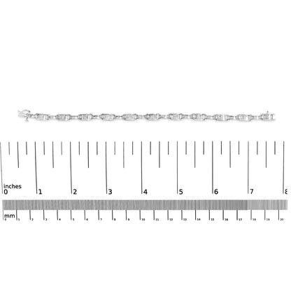 White metal bracelet with evenly spaced rectangular links set with white princess-shaped gemstones in an invisible setting, displayed horizontally on a ruler, top-down view.