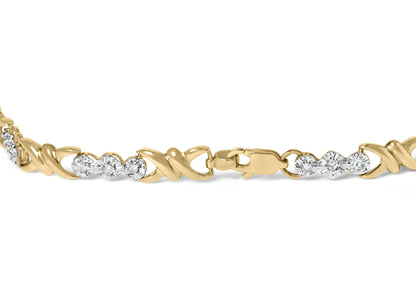 Close-up front view of a yellow bracelet featuring alternating twisted links and clusters of round white gemstones in a miracle setting with a clasp.