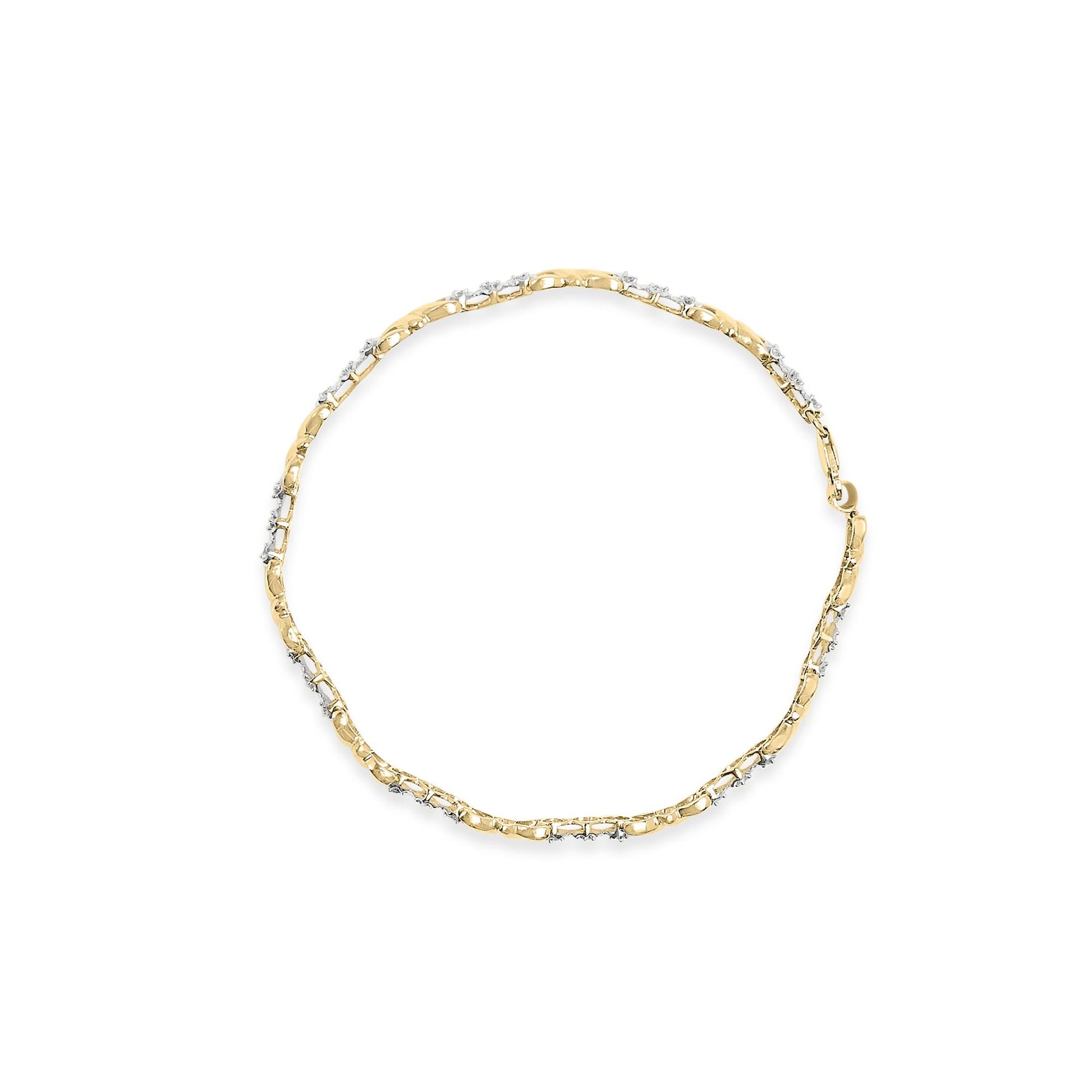 Top-down view of a yellow bracelet with round white gemstones set in a miracle setting along the band.