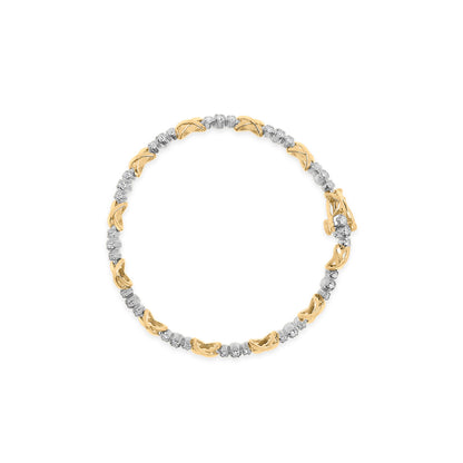 Top-down view of a yellow and white metal bracelet featuring alternating yellow metal links and prong-set white round gemstones forming a continuous circle.