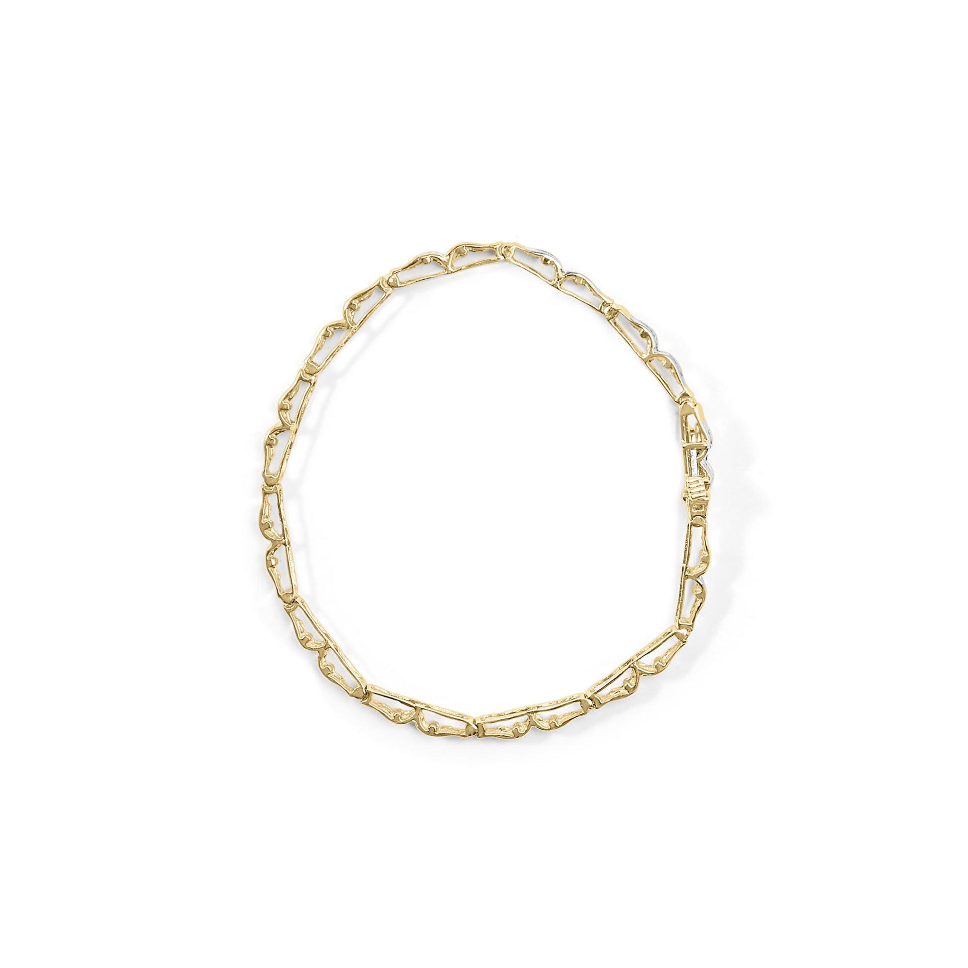 Top-down view of a yellow metal bracelet with an open-link design, shown flat on a white background.
