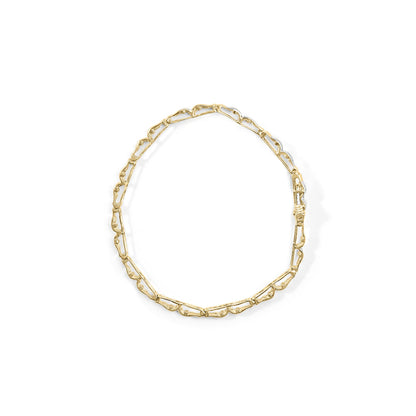Top-down view of a yellow metal bracelet with an open-link design, shown flat on a white background.