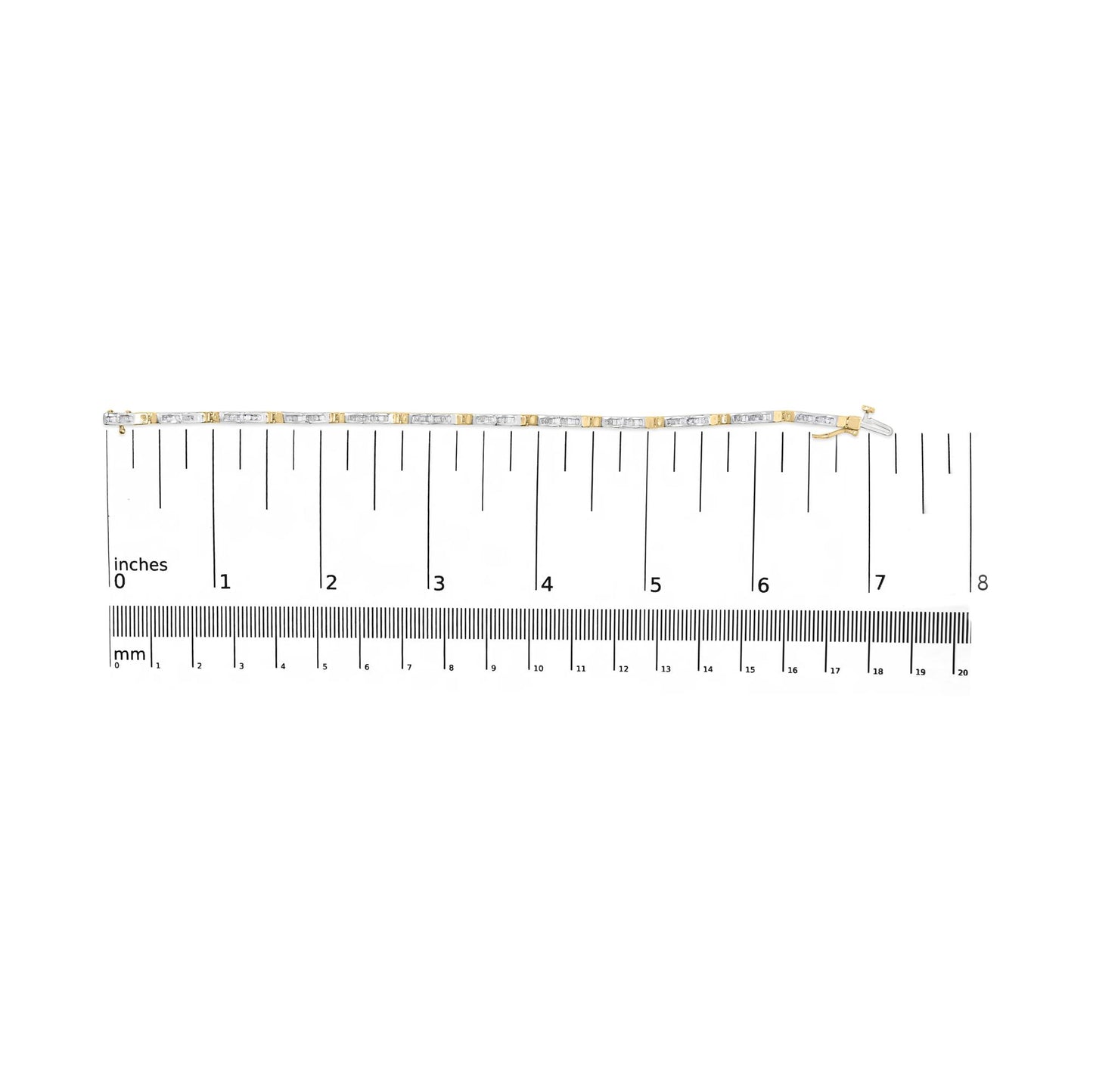 Yellow metal bracelet with white baguette-shaped gemstones in channel setting, shown laid flat on a ruler for scale, top-down angle.