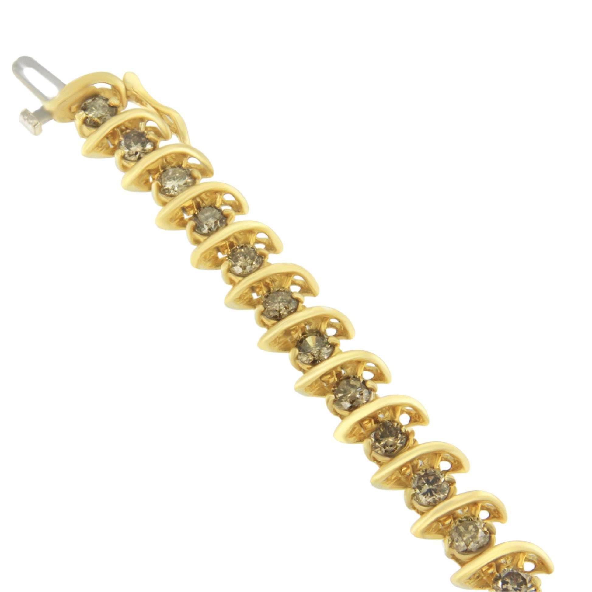 Yellow metal bracelet with round prong-set brown gemstones, shown from a slightly angled top view.
