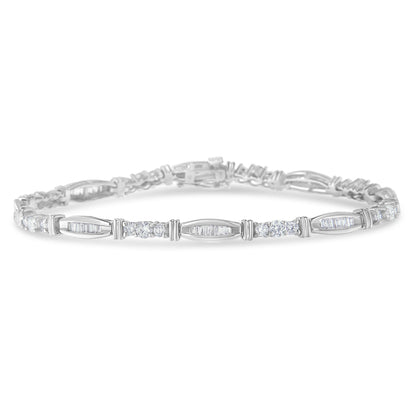 White metal bracelet with alternating round prong-set white gemstones and baguette channel-set white gemstones, shown in a front-facing angle.
