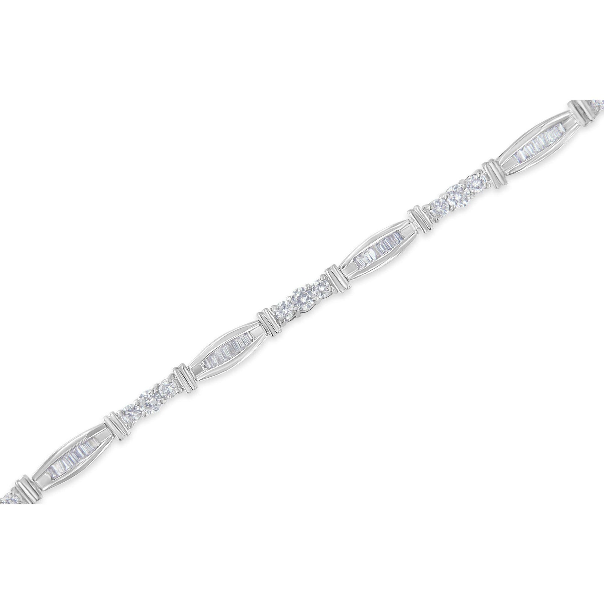 White metal bracelet with alternating sections of round white gemstones in prong settings and elongated segments containing baguette white gemstones in channel settings, shown in a close-up diagonal angle.