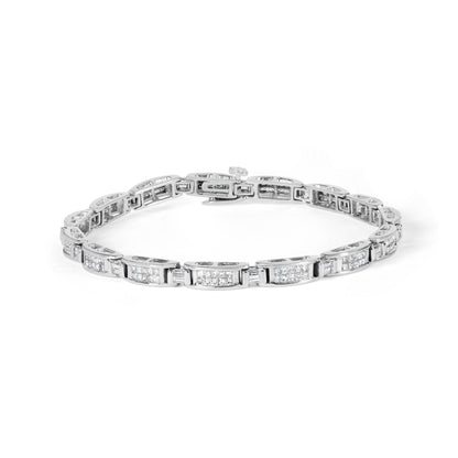 White metal bracelet with alternating baguette and princess shape white gemstones, shown from a front angle on a white background.