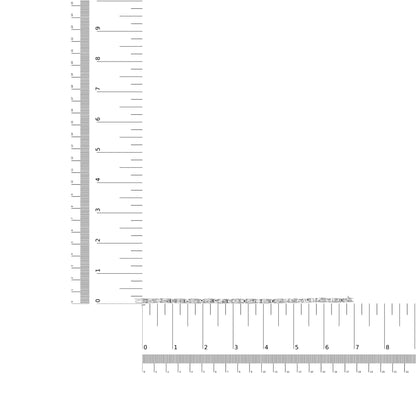 White metal bracelet with alternating baguette shape prong-set white gemstones and princess shape invisible-set white gemstones, laid flat on a ruler for size reference, shot from above.