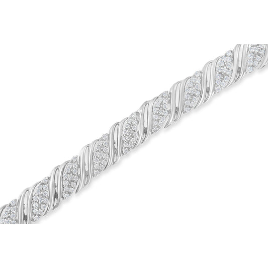 Close-up angled view of a white metal bracelet with a twisted design featuring round white gemstones in prong settings.