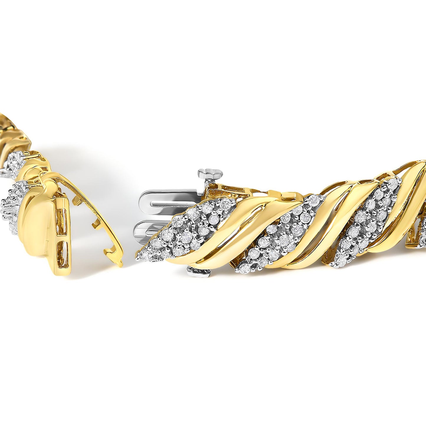 Close-up of a yellow metal bracelet with white round gemstones in prong settings, shown from the side angle with the clasp open.
