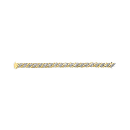 Yellow metal bracelet with alternating diagonal rows of small white gemstones and smooth yellow metal bands, shown from a front angle on a white background.