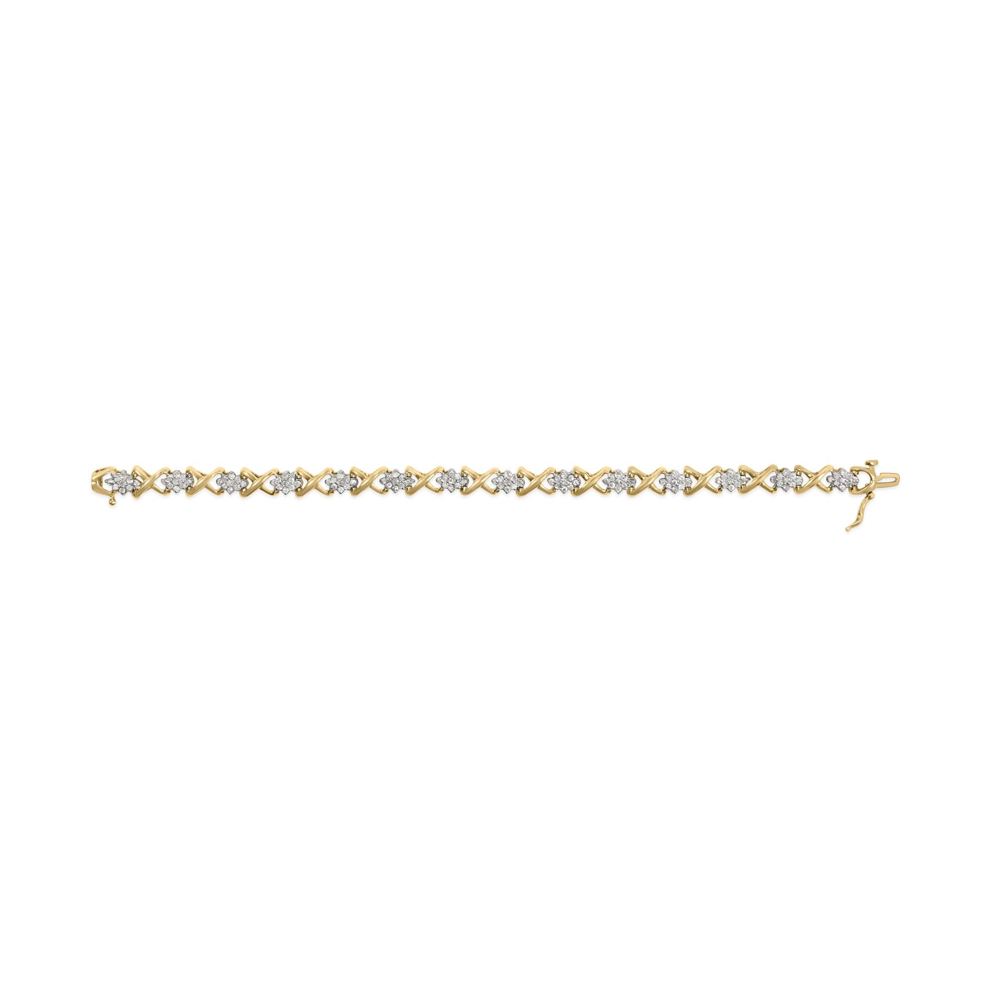 Yellow metal bracelet with round white gemstones in prong settings, laid flat in a top-down view.