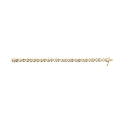 Yellow metal bracelet with round white gemstones in prong settings, laid flat in a top-down view.