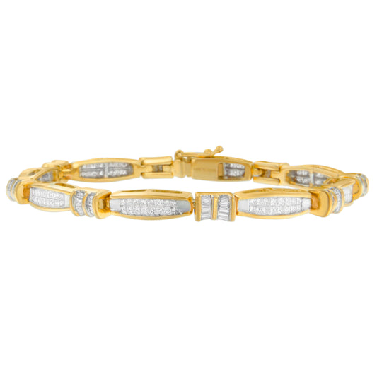 Front-facing view of a yellow metal bracelet featuring elongated links set with white baguette and princess-shaped gemstones in channel and invisible settings.