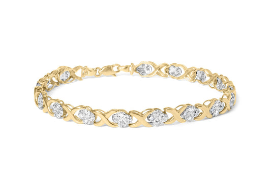 Yellow bracelet with round white gemstones in pave setting, shown from a slight side angle on a white background.
