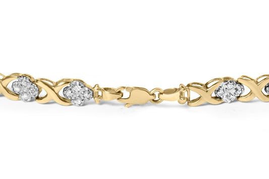 Close-up front view of a yellow bracelet with alternating X-shaped links and clusters of round white gemstones in pave setting, featuring a lobster clasp.