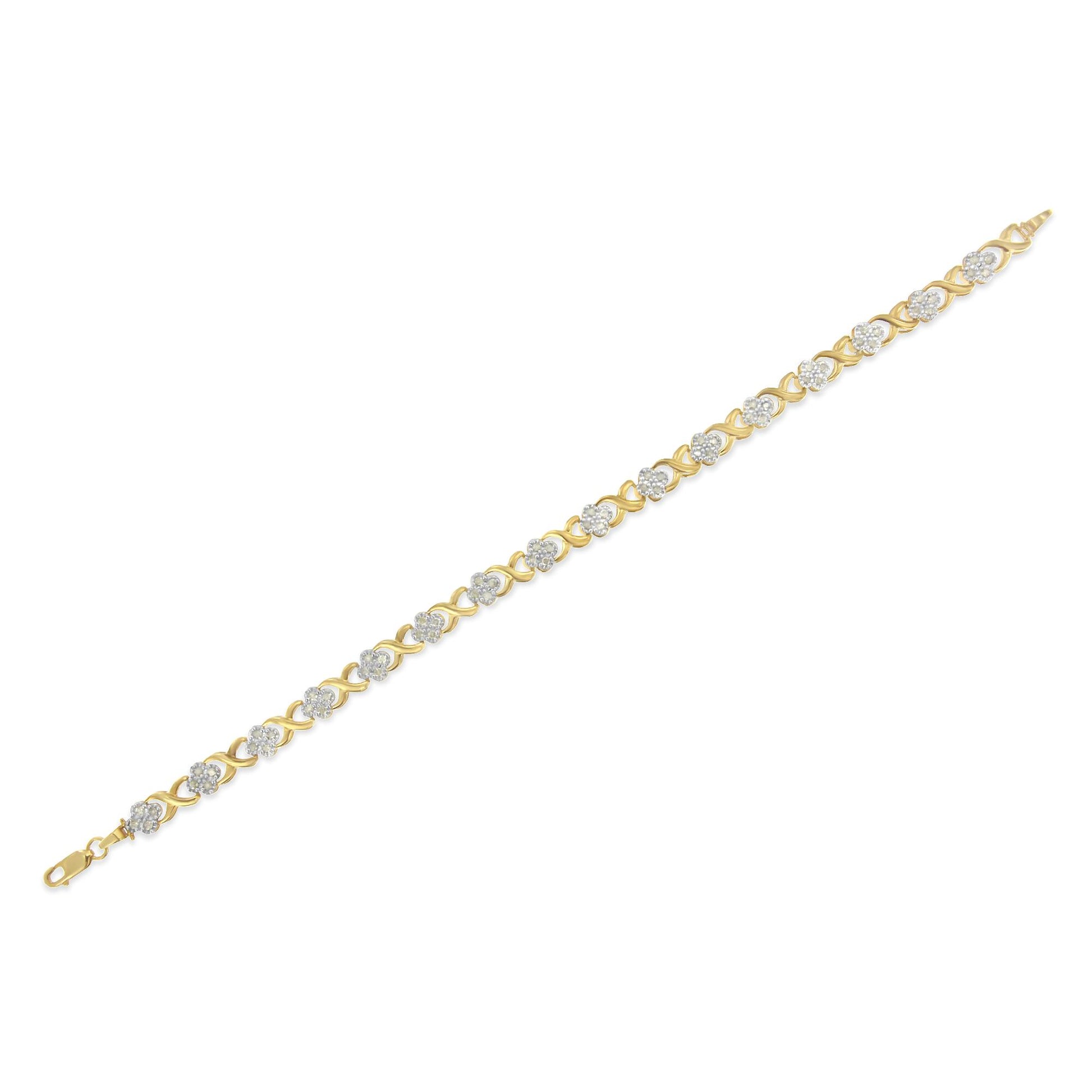 Yellow metal bracelet with round white gemstones in pave setting, shown flat from an angled top view.