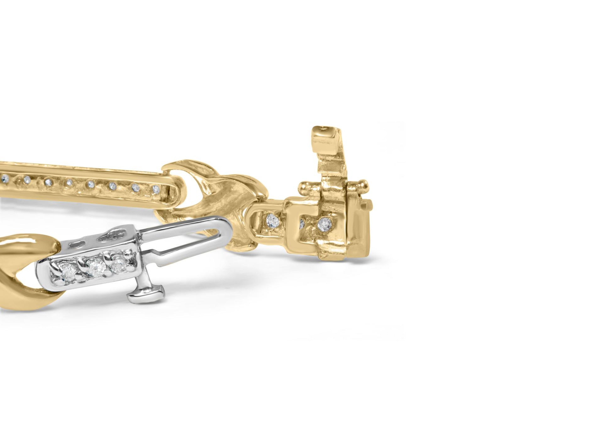 Close-up side view of yellow bracelet clasp featuring round white gemstones in prong settings.