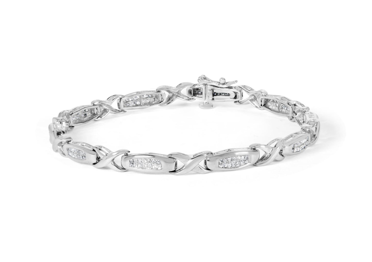 White metal bracelet with alternating links and rectangular settings holding multiple white gemstones, shown from an angled top view on a white background.