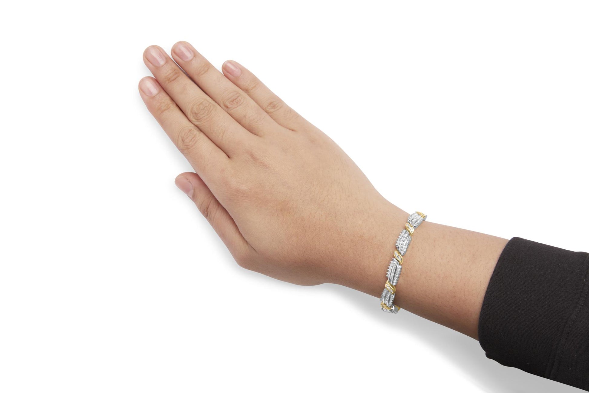 Bracelet with alternating yellow and white segments featuring round white gemstones in prong settings and baguette white gemstones in channel settings, shown worn on a model's wrist in a top-down angle.