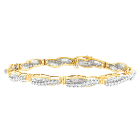 Yellow metal bracelet with alternating rows of round prong-set white gemstones and baguette channel-set white gemstones, shown in a straight-on angle.