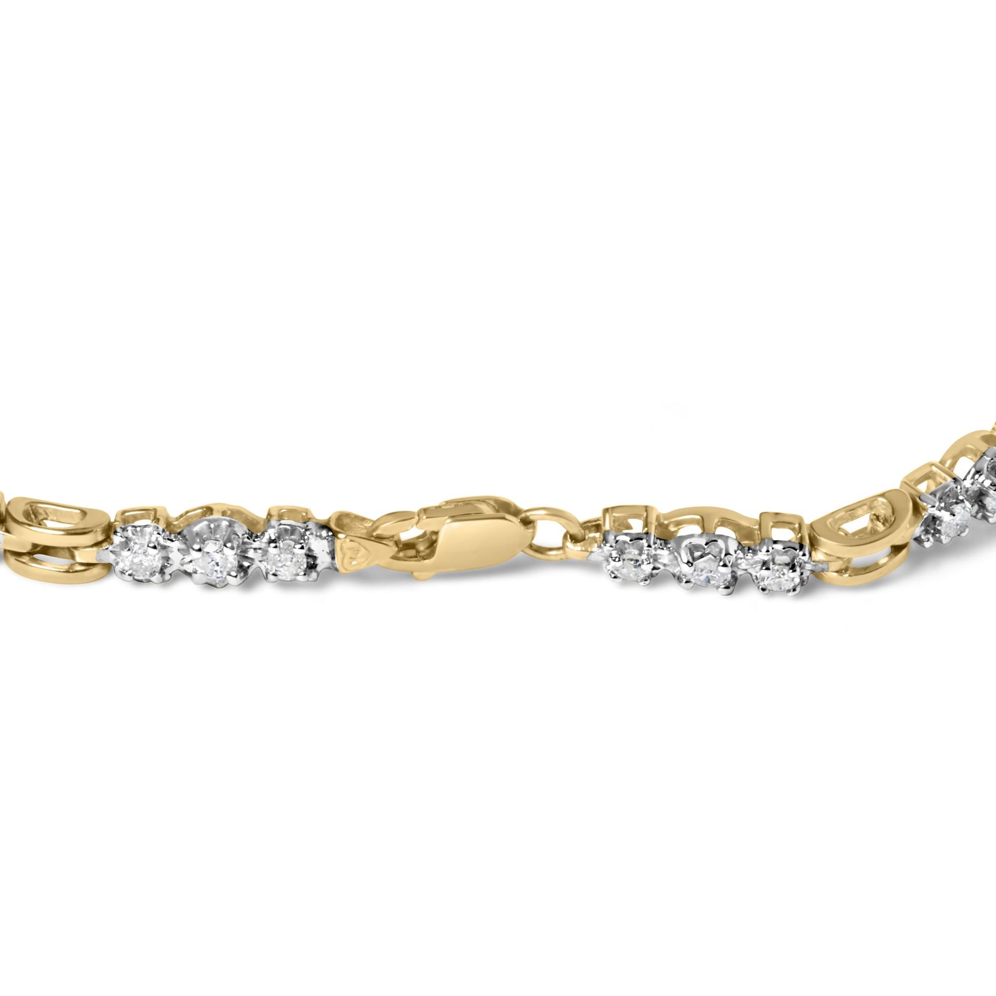 Close-up side angle of a yellow and white metal bracelet with round white gemstones in prong settings along the band, featuring a clasp closure.