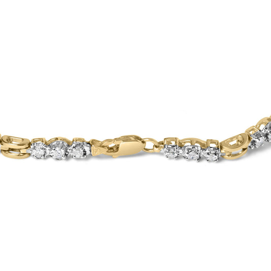 Close-up side angle of a yellow and white metal bracelet with round white gemstones in prong settings along the band, featuring a clasp closure.