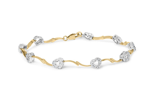 Bracelet with alternating yellow and white metal links featuring round white gemstones in prong settings, shown at a slight top angle on a white background.