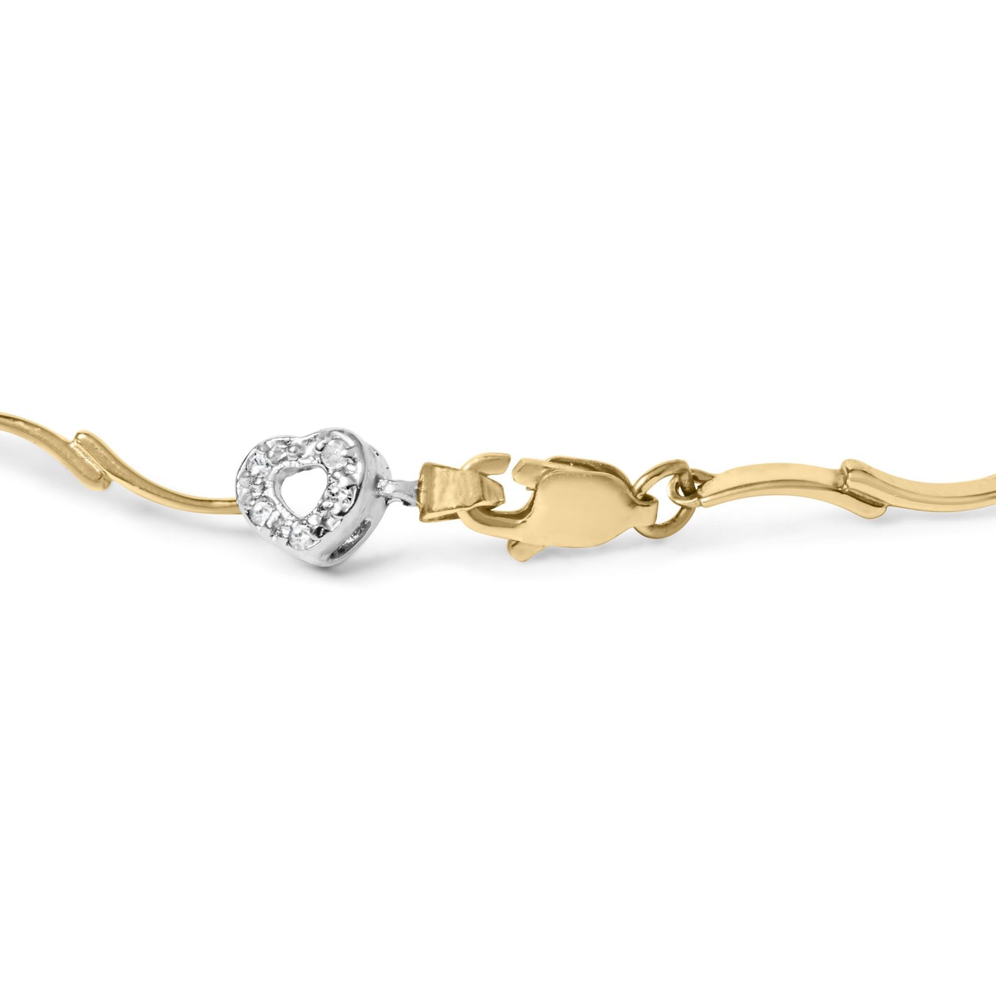 Close-up side view of a two-tone bracelet clasp featuring a heart-shaped element with white round gemstones in a prong setting.
