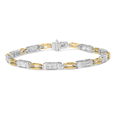 Two-toned bracelet with rectangular links featuring clusters of white gemstones in invisible settings, shown in a close-up angled top view.