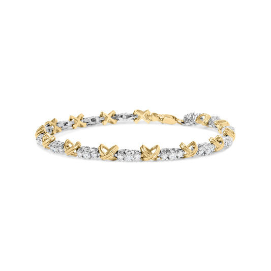 Close-up, front-facing shot of a bracelet featuring alternating yellow and white metal links with round white gemstones in prong settings.