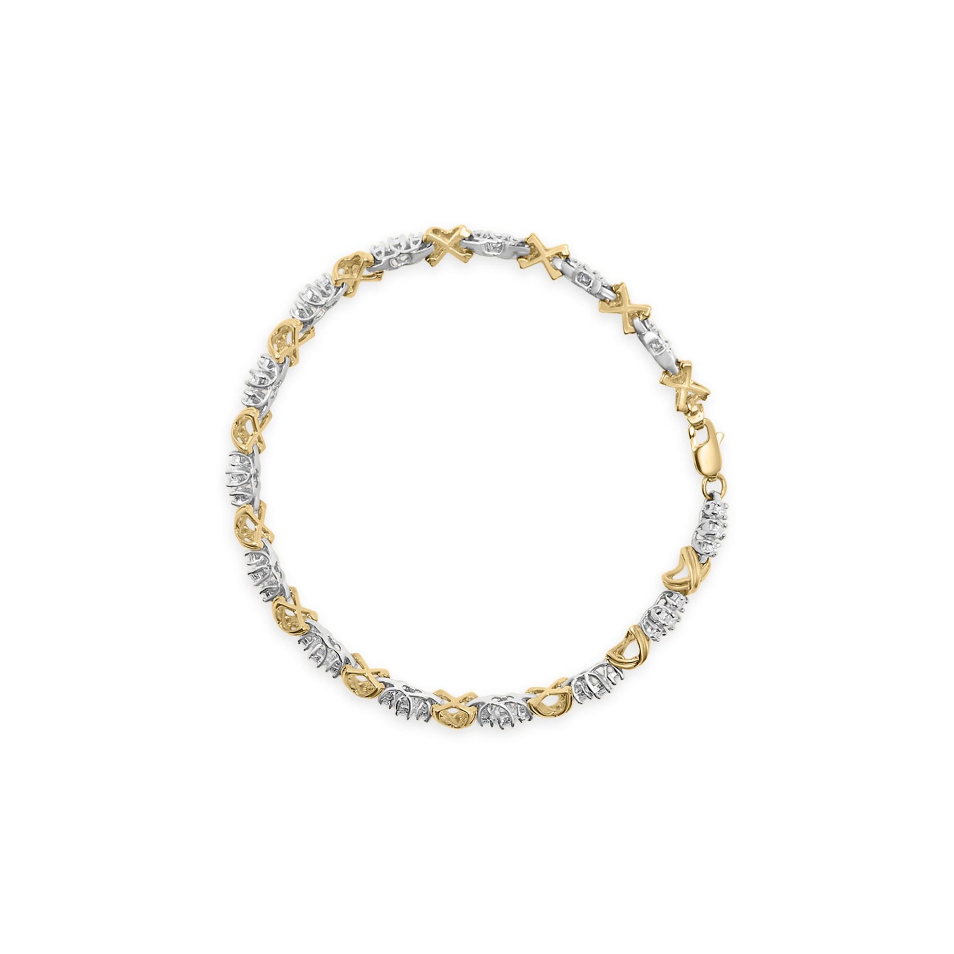 Top-down view of a round bracelet featuring alternating yellow and white metal links, with round white gemstones set in prongs.