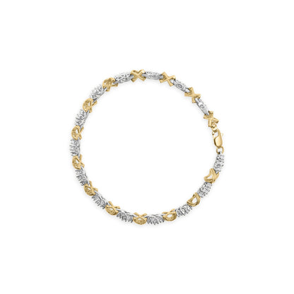 Top-down view of a round bracelet featuring alternating yellow and white metal links, with round white gemstones set in prongs.