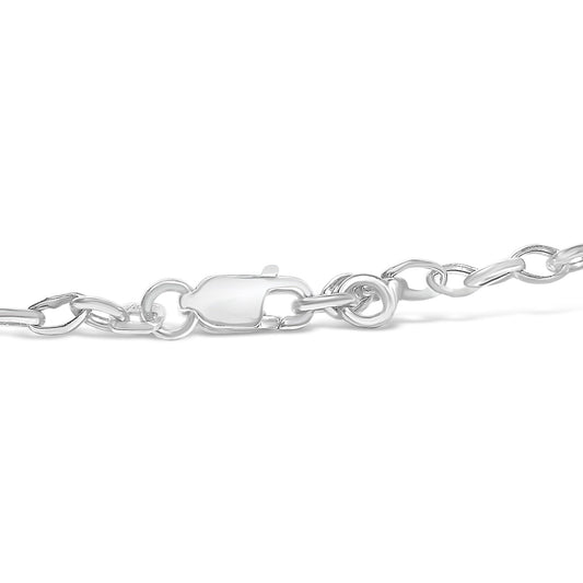 Close-up side view of a white metal chain bracelet clasp with links.
