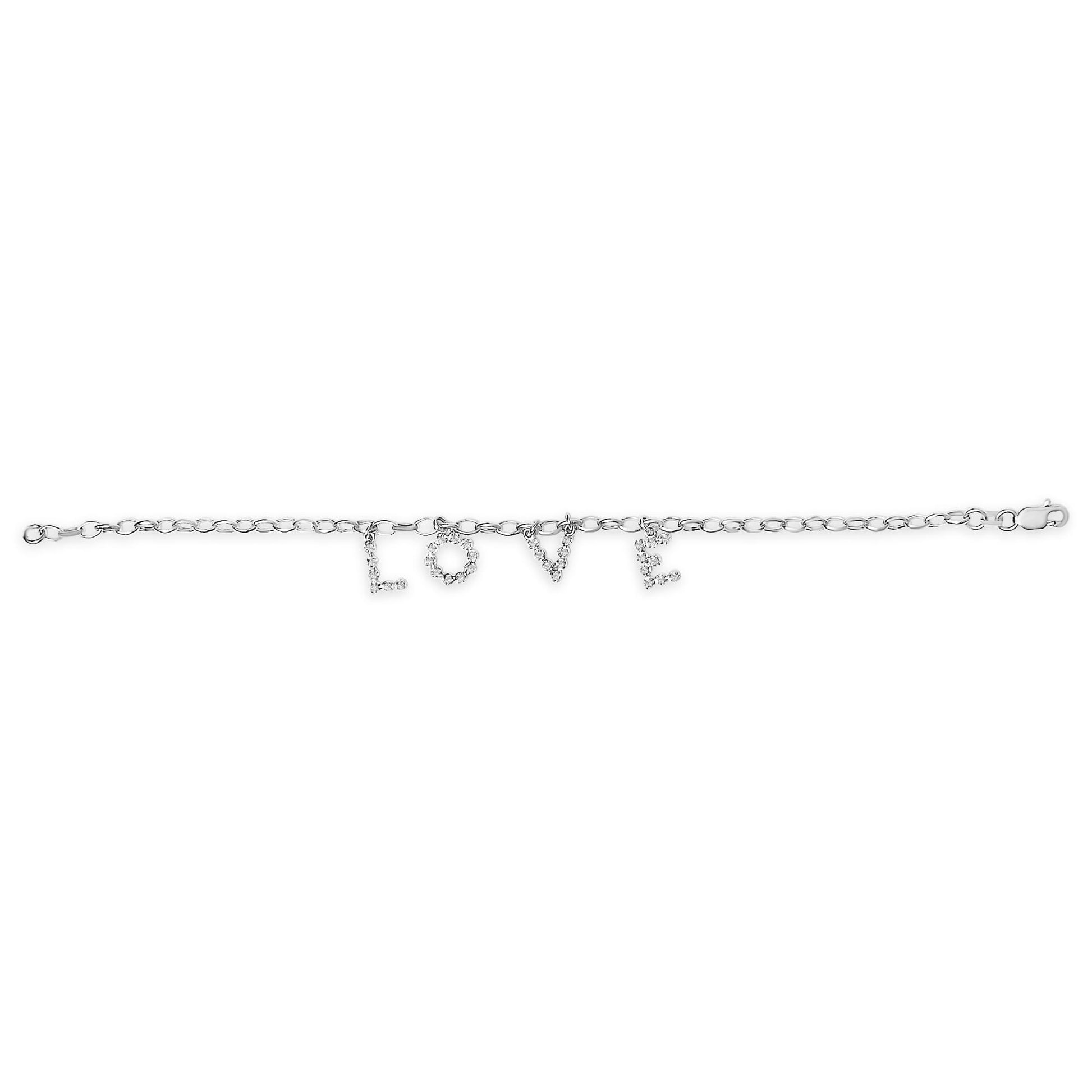 White metal bracelet with chain links and hanging charms spelling 'LOVE' adorned with white round gemstones, shown flat from above.