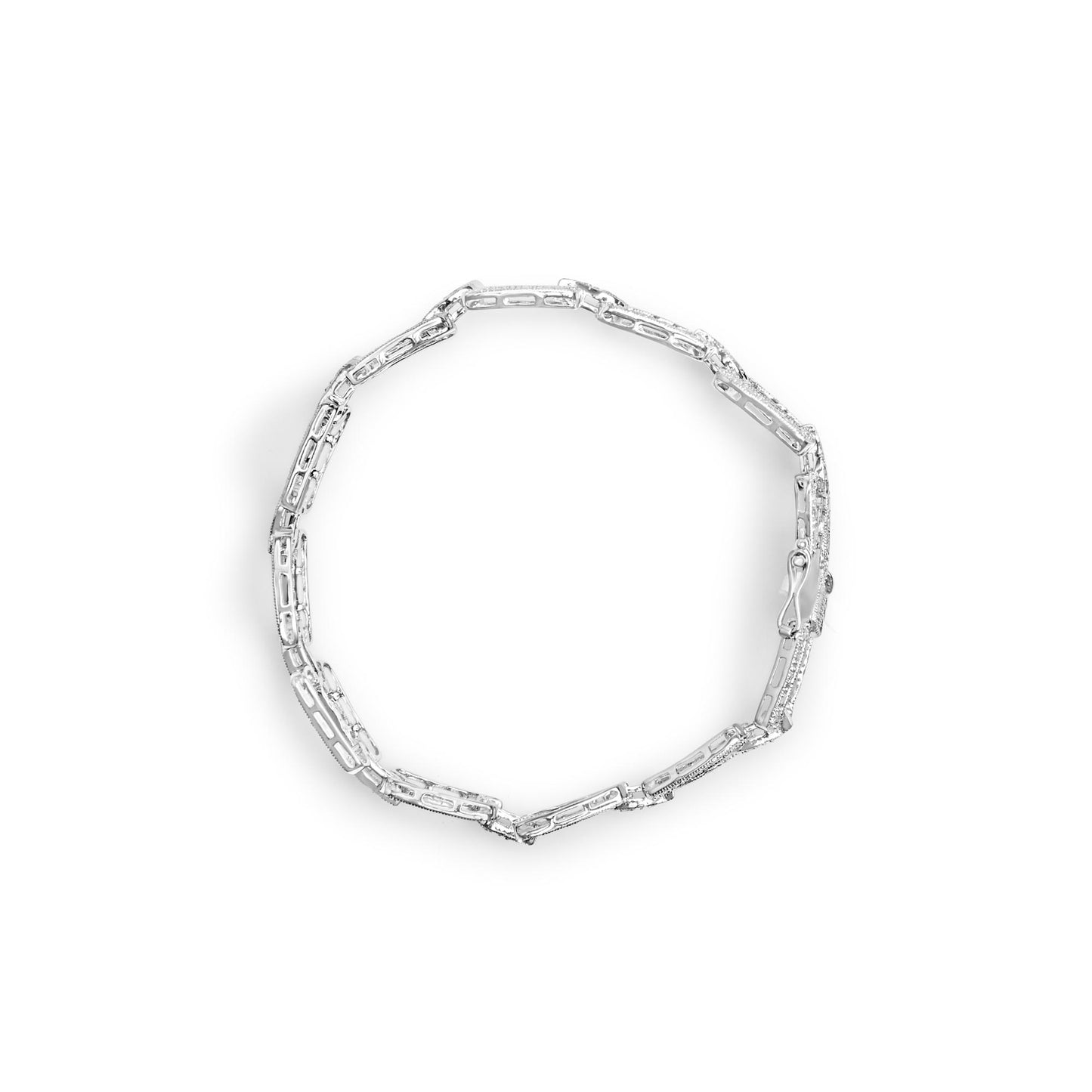 Top-down view of a white metal bracelet with linked rectangular segments, some featuring pave-set round white gemstones.