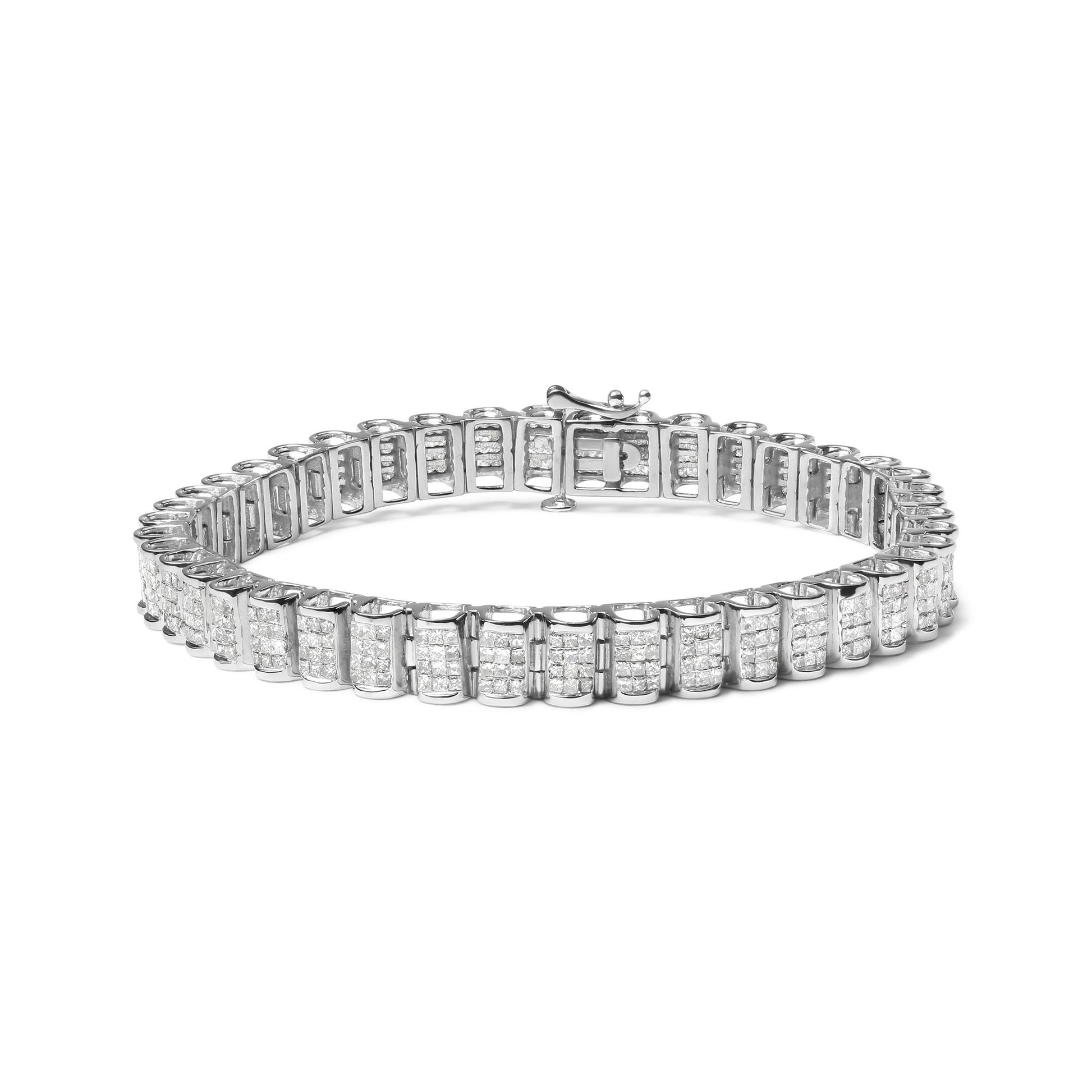 White metal bracelet with rectangular panels featuring multiple rows of small white gemstones in an invisible setting, shown from a front angled view on a white background.