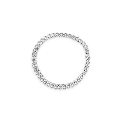 Top-down view of a white metal bracelet featuring a continuous row of square-shaped settings, each holding a white gemstone.