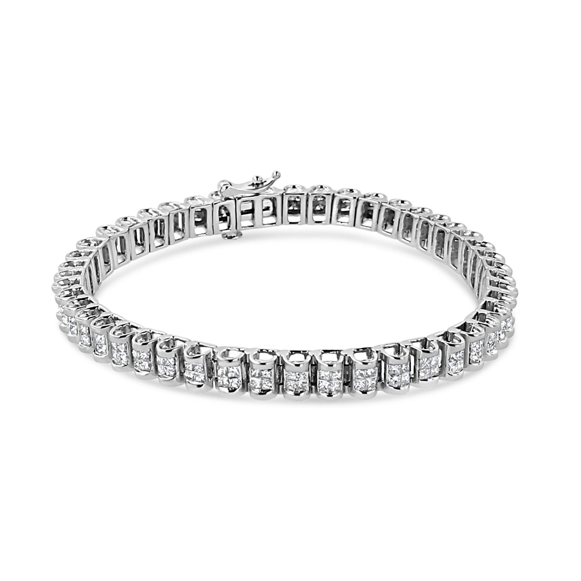White metal bracelet with princess-shaped white gemstones in a channel setting, shown from an angled top view.