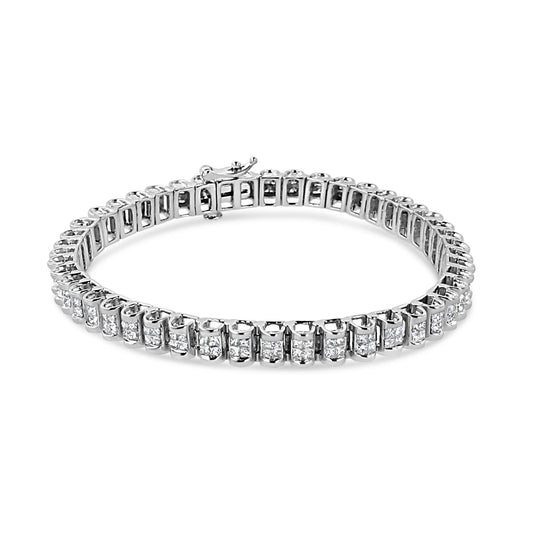 White metal bracelet with princess-shaped white gemstones in a channel setting, shown from an angled top view.