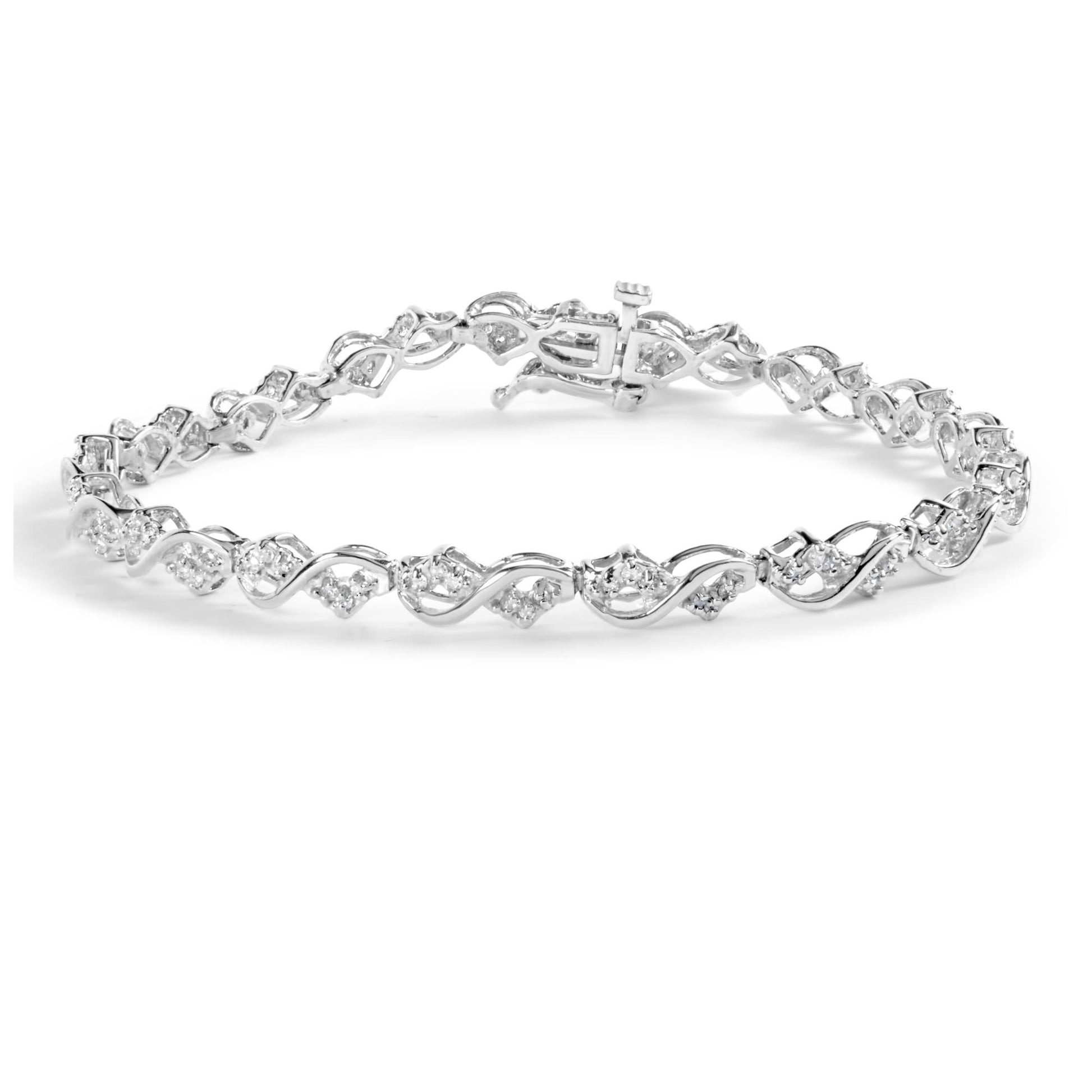 White metal bracelet with alternating twisted links and clusters of round white gemstones in prong settings, shown from a front angle.
