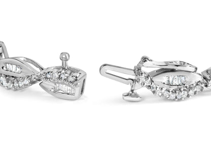 Close-up angled view of a white bracelet featuring round gemstones in prong settings and baguette gemstones in channel settings along a twisted design.