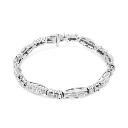White metal bracelet with alternating segments featuring white gemstones in princess and baguette shapes, shown from a top angle.