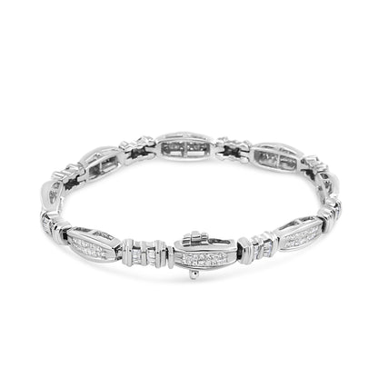 White metal bracelet with princess and baguette shaped white gemstones, shown from an angled top view.