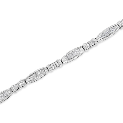 Diagonal close-up of a white metal bracelet featuring alternating sections with invisible-set princess shape white gemstones and channel-set baguette shape white gemstones.
