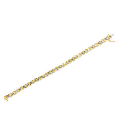 Yellow metal bracelet with alternating round white gemstones in pave setting, shown flat from a top-down angle.