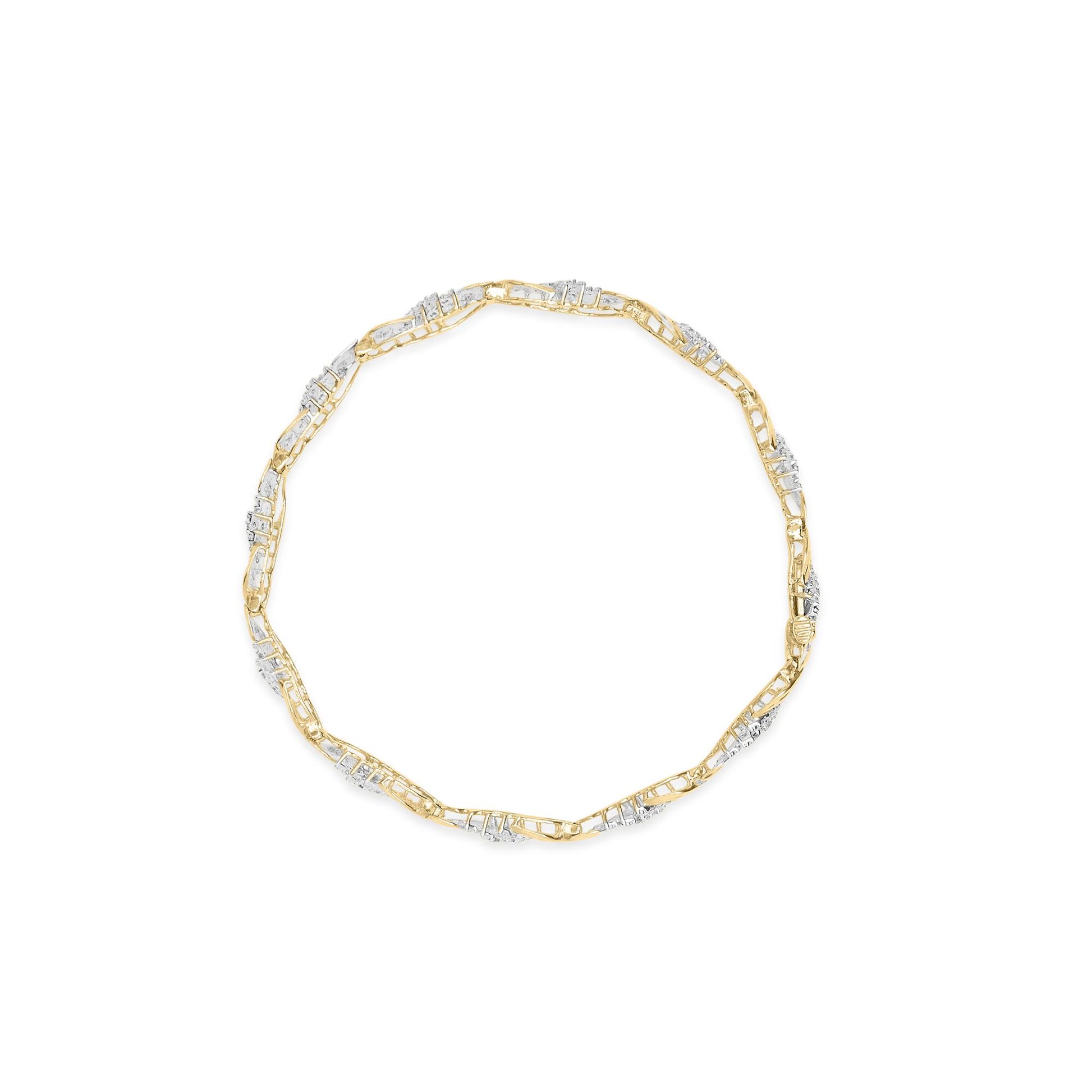 Top-down view of a yellow metal bracelet featuring alternating sections of round prong-set white gemstones and baguette channel-set white gemstones.