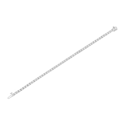 White metal bracelet with round white gemstones in prong settings, shown flat at a slight diagonal angle on a white background.